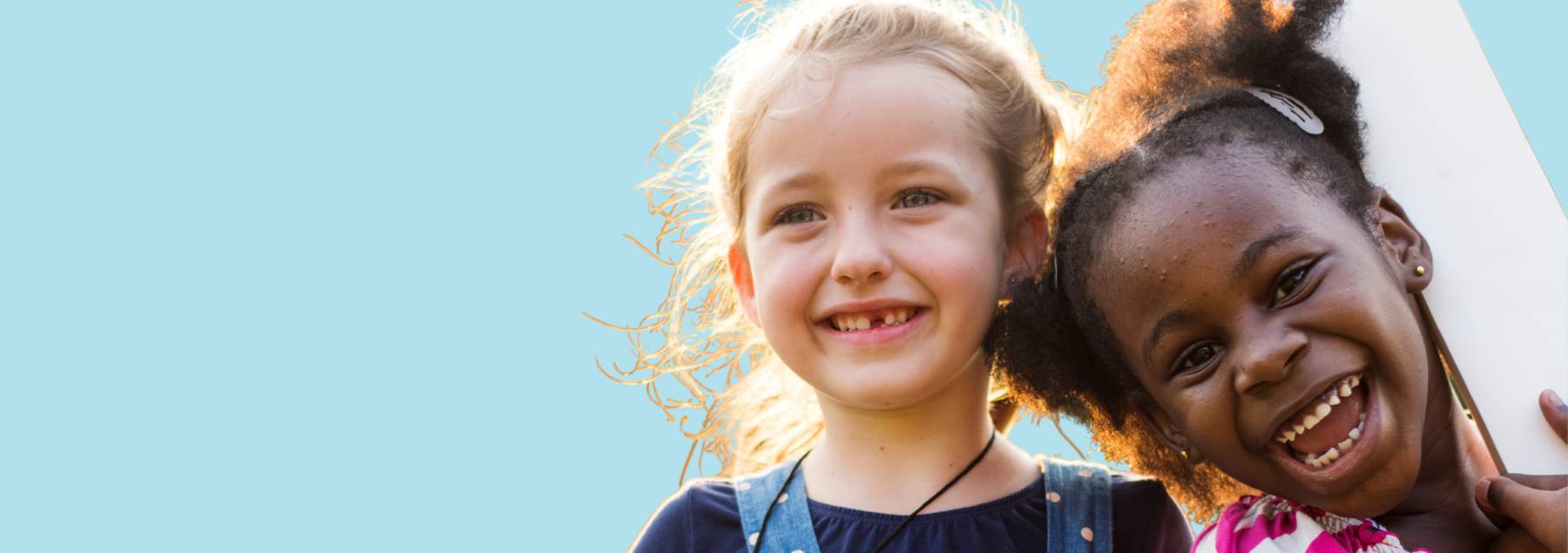 two children smiling
